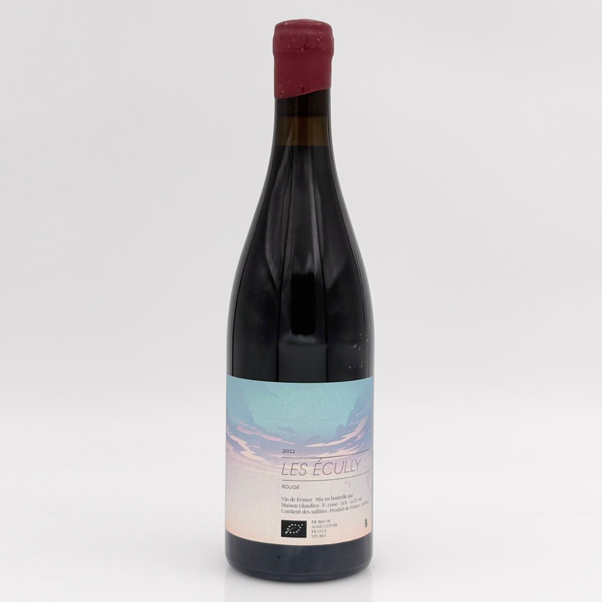 Wine bottle with a label on a white background