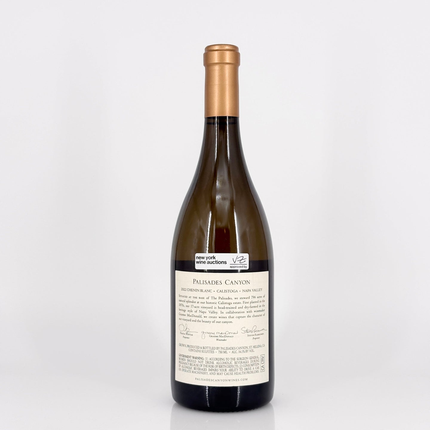 Wine bottle with a gold foil cap on a white background