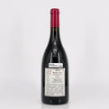 Wine bottle with a label on a white background