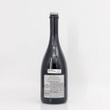 Wine bottle with a label on a white background