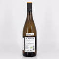 Wine bottle labeled 'El Muelle' by Luis Perez on a white background
