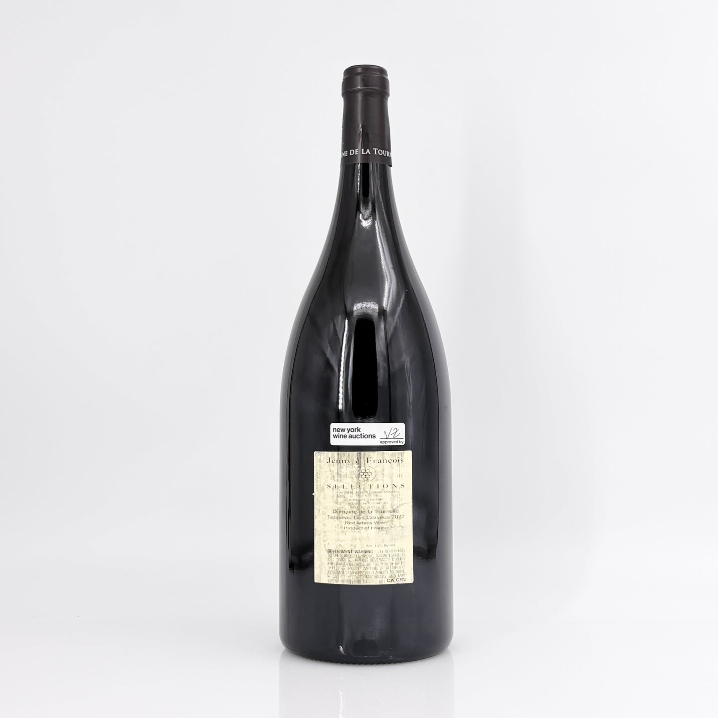 Large bottle of wine with a label on a white background