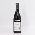 Wine bottle with a label on a white background