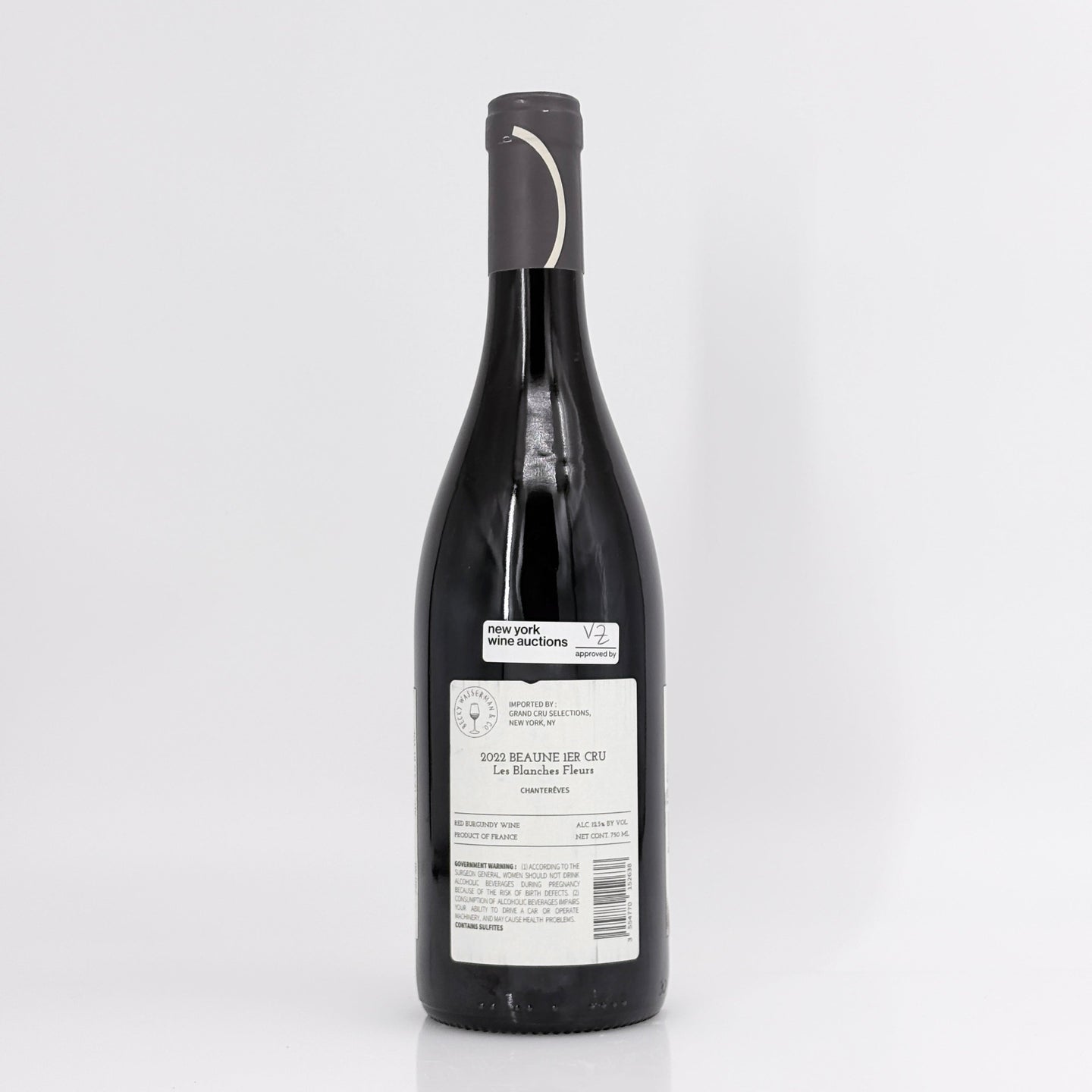 Wine bottle with a label on a white background