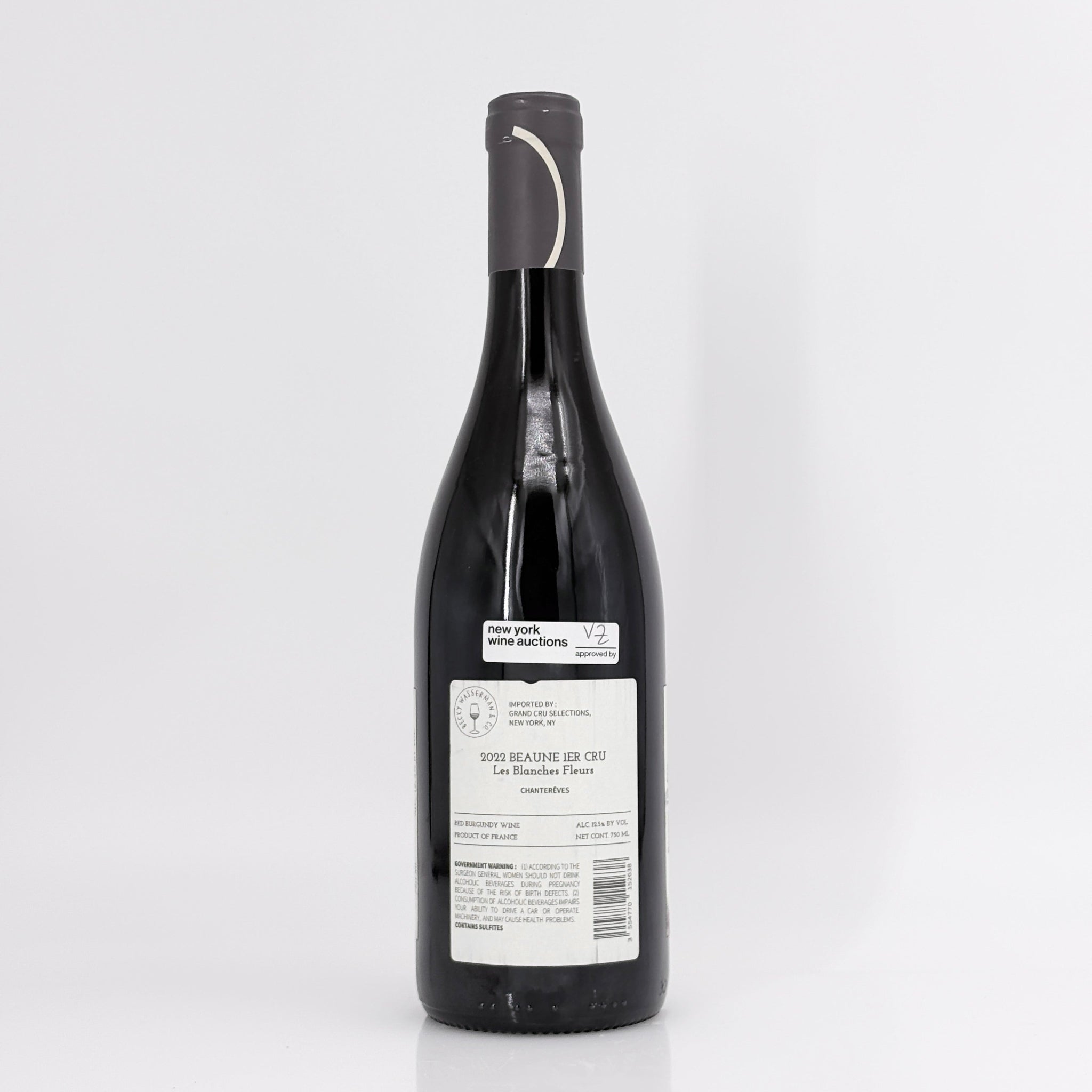 Wine bottle with a label on a white background