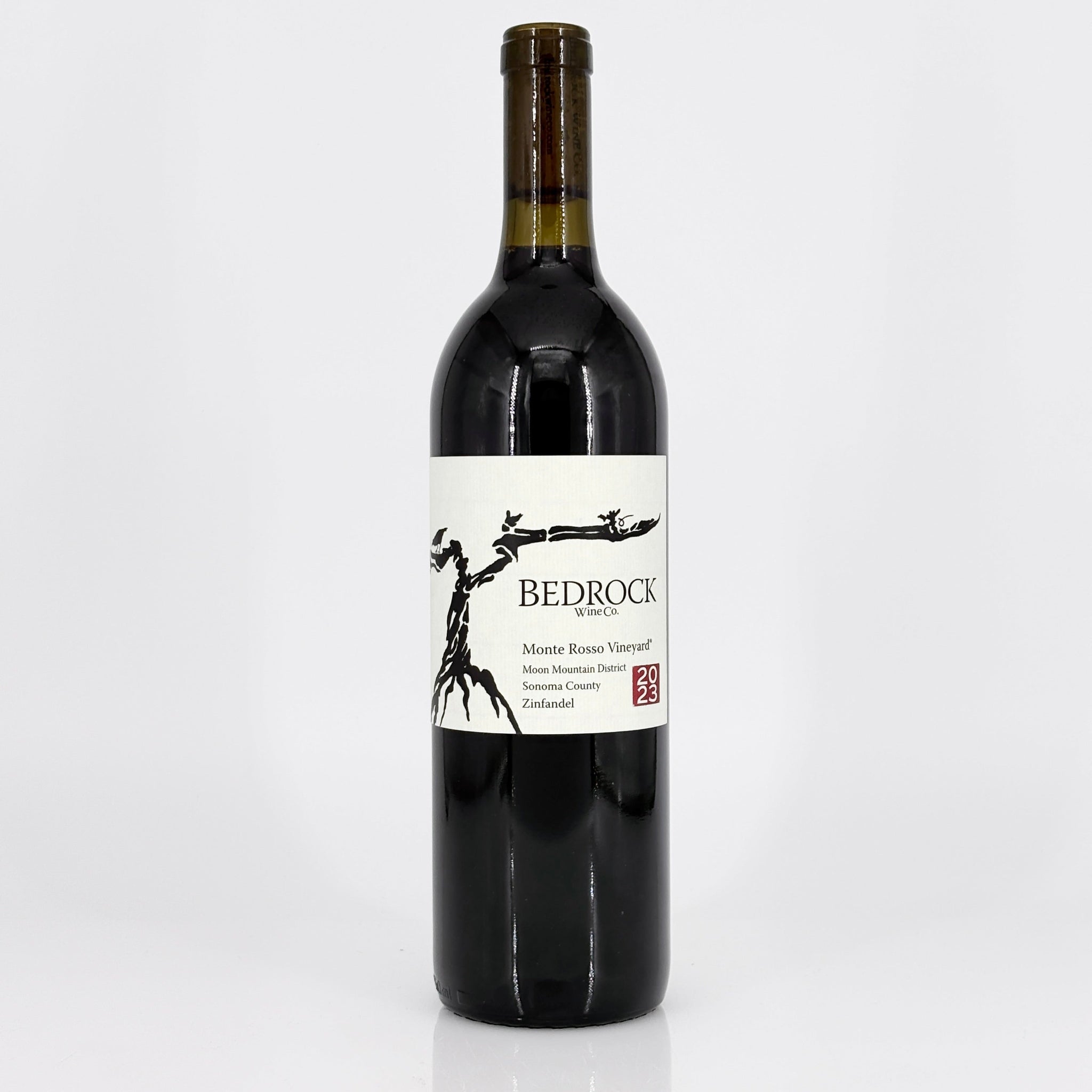 Wine bottle with 'Bedrock' label on a white background