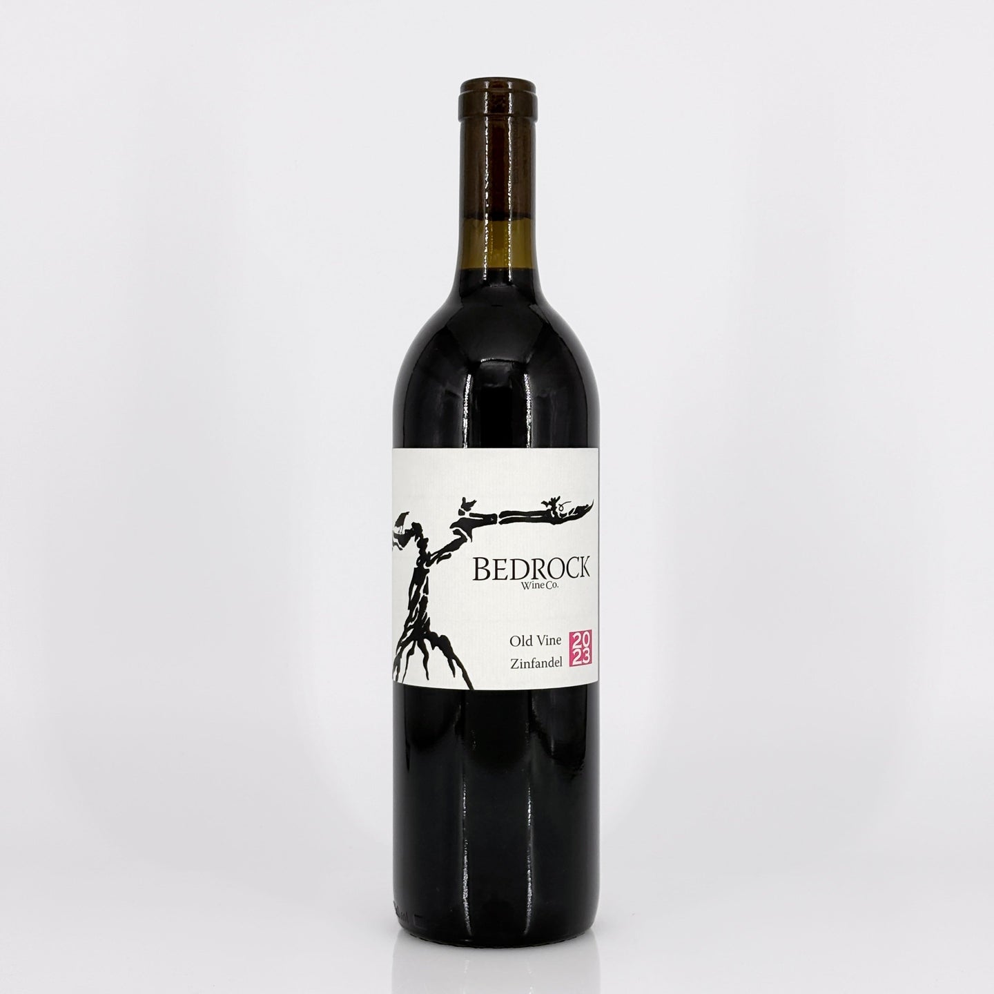 Wine bottle with 'Bedrock' label on a white background