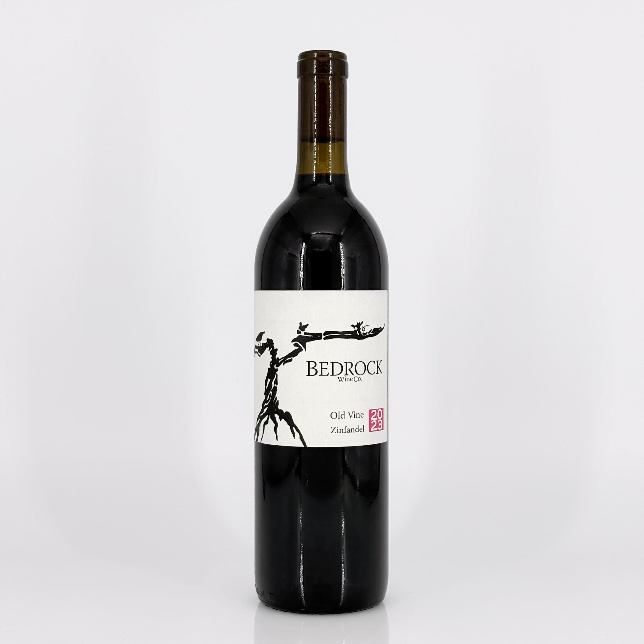 Wine bottle with 'Bedrock' label on a white background