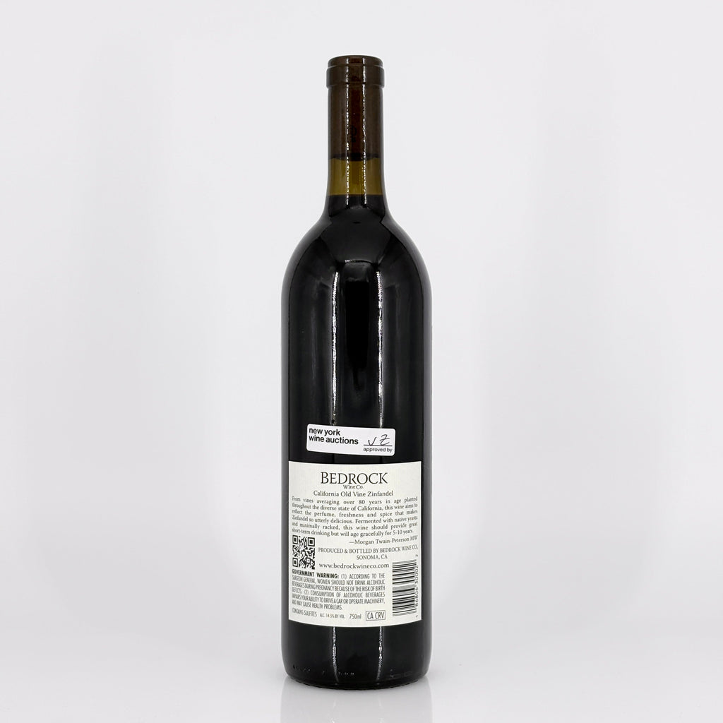 Wine bottle labeled 'Bedrock' on a white background