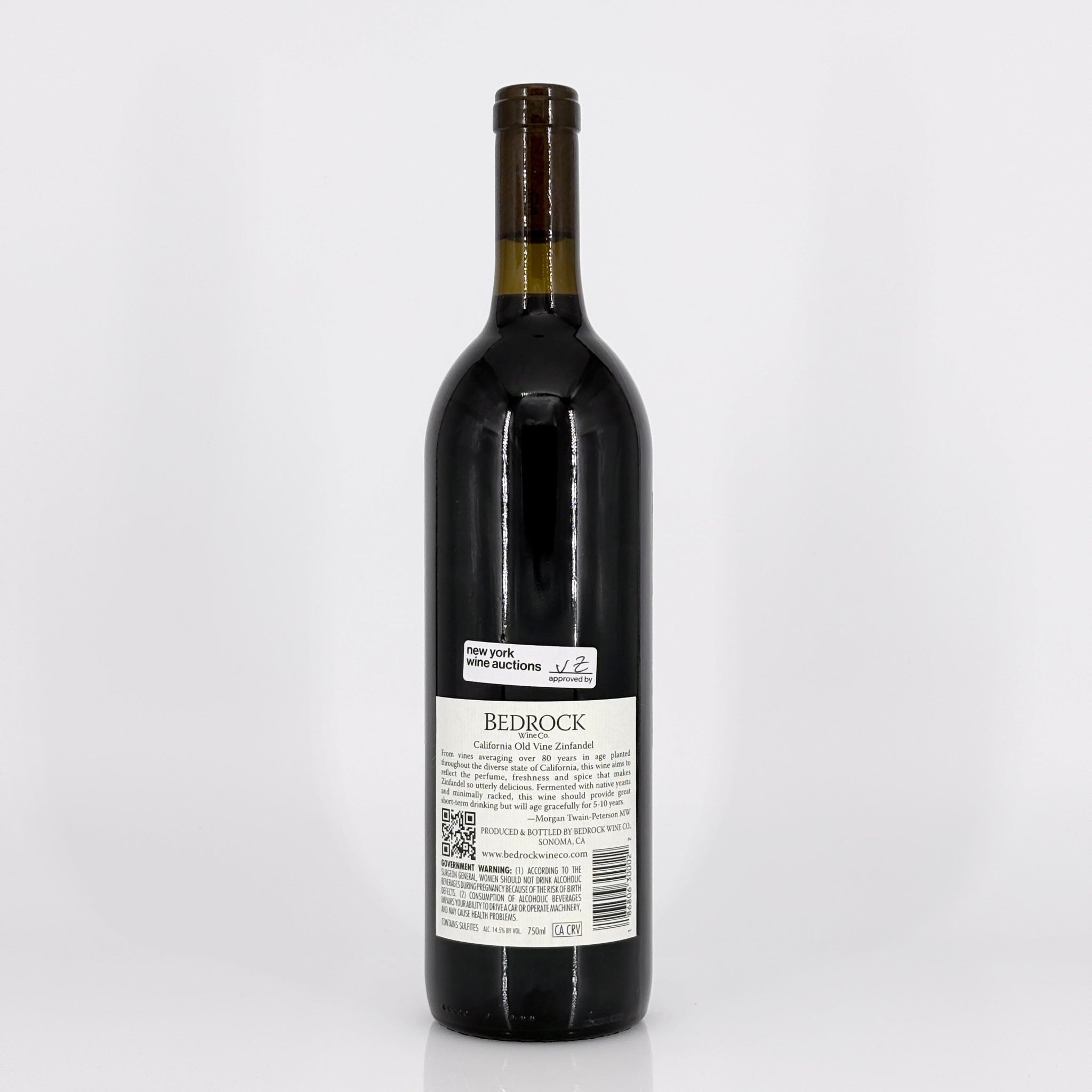 Wine bottle labeled 'Bedrock' on a white background