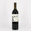 Wine bottle with 'Bedrock' label on a white background