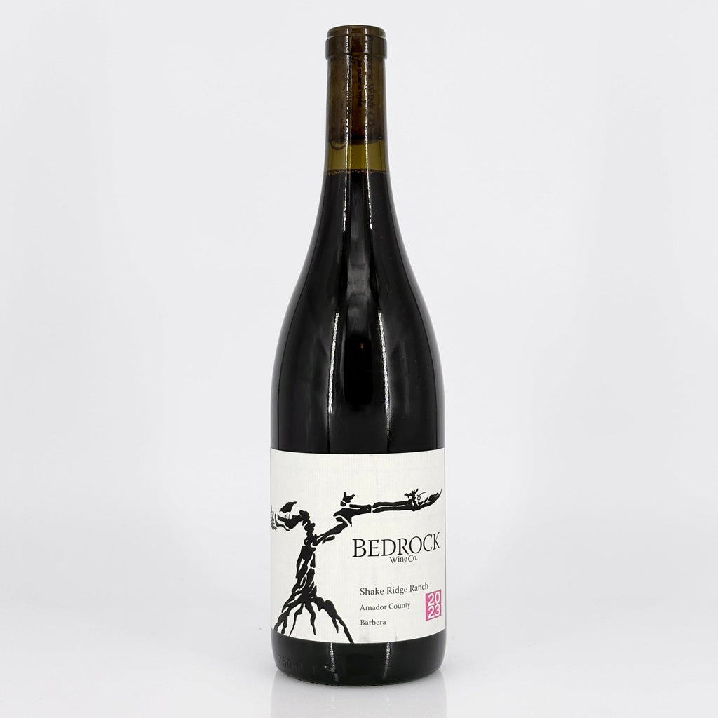 Wine bottle with 'Bedrock' label on a white background