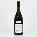 Wine bottle with a label on a white background