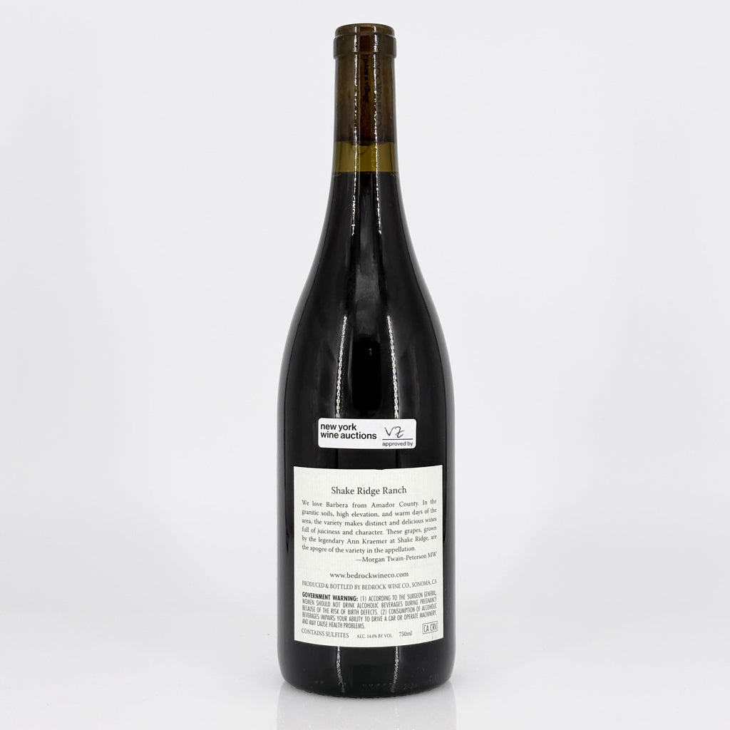 Wine bottle with a label on a white background