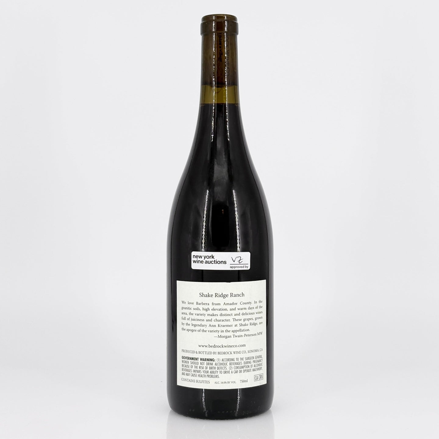 Wine bottle with a label on a white background