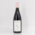 Wine bottle with a label on a white background