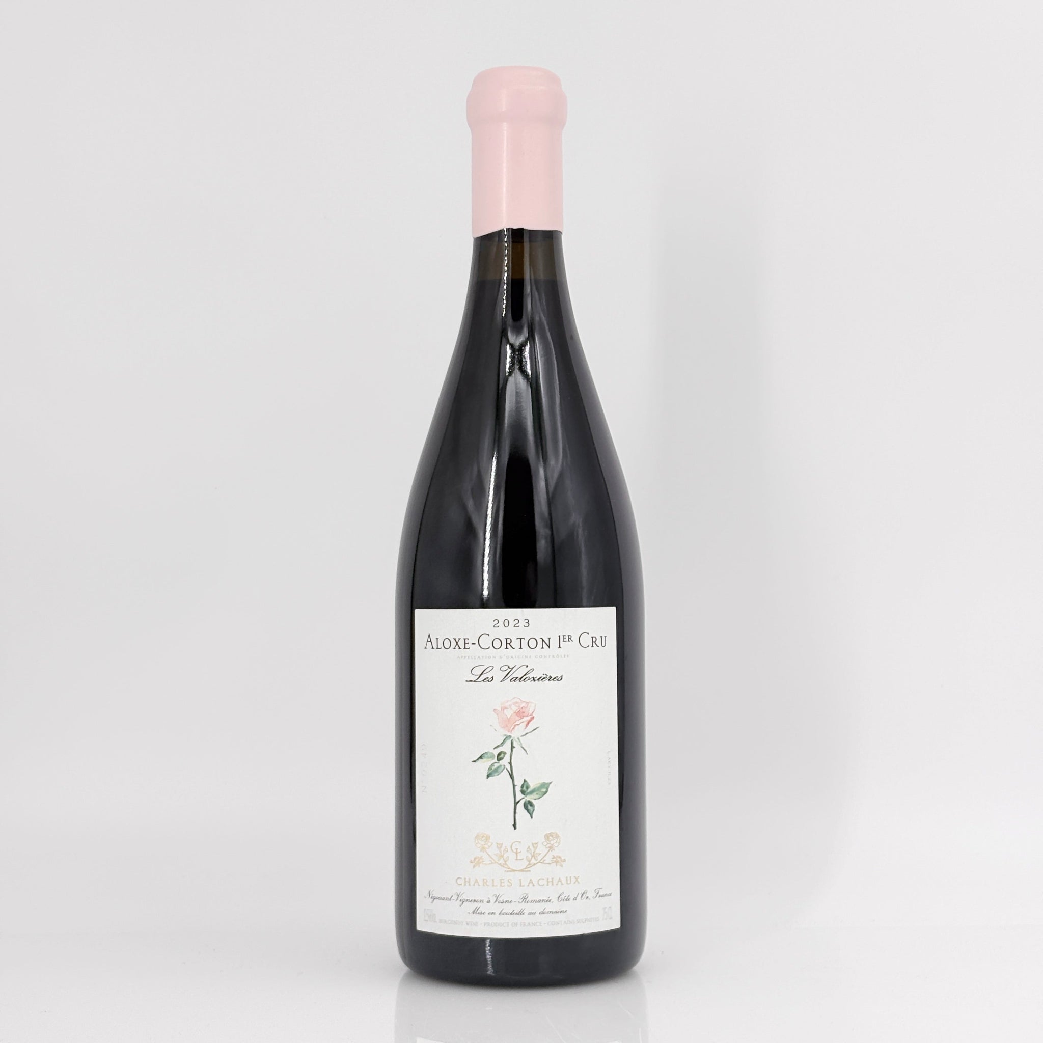 Wine bottle with a label on a white background