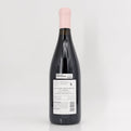 Wine bottle with a label on a white background