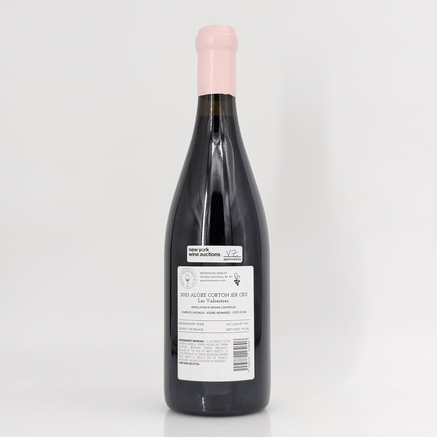 Wine bottle with a label on a white background