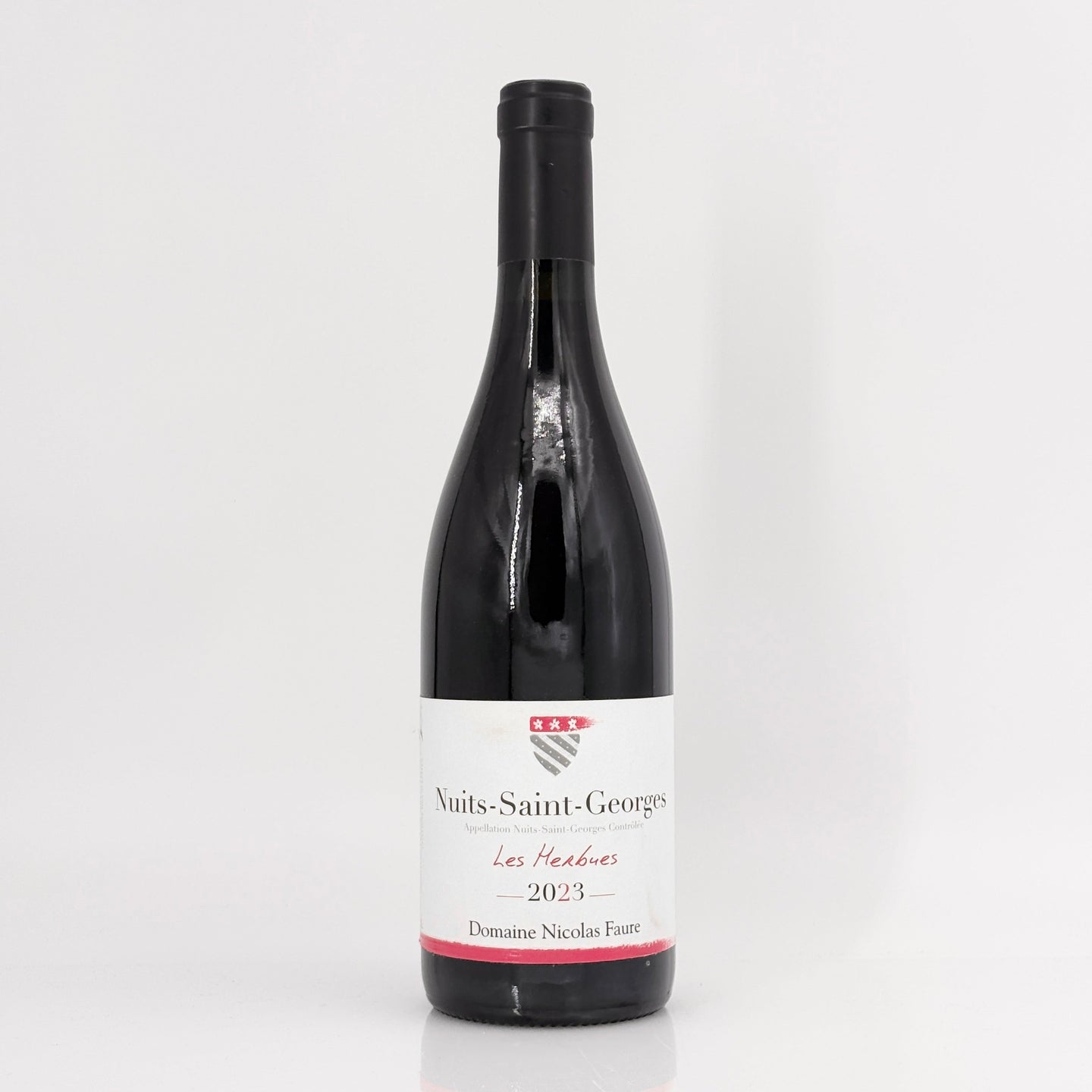 Wine bottle with a label on a white background