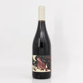 Wine bottle with a label on a white background
