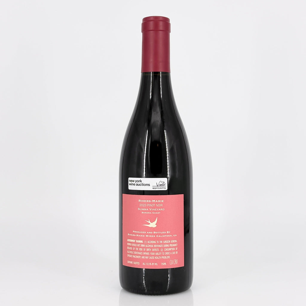 Red wine bottle with a pink label on a white background