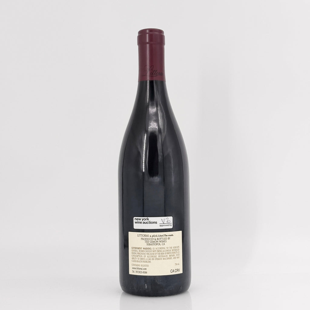 Wine bottle with a visible label on a white background