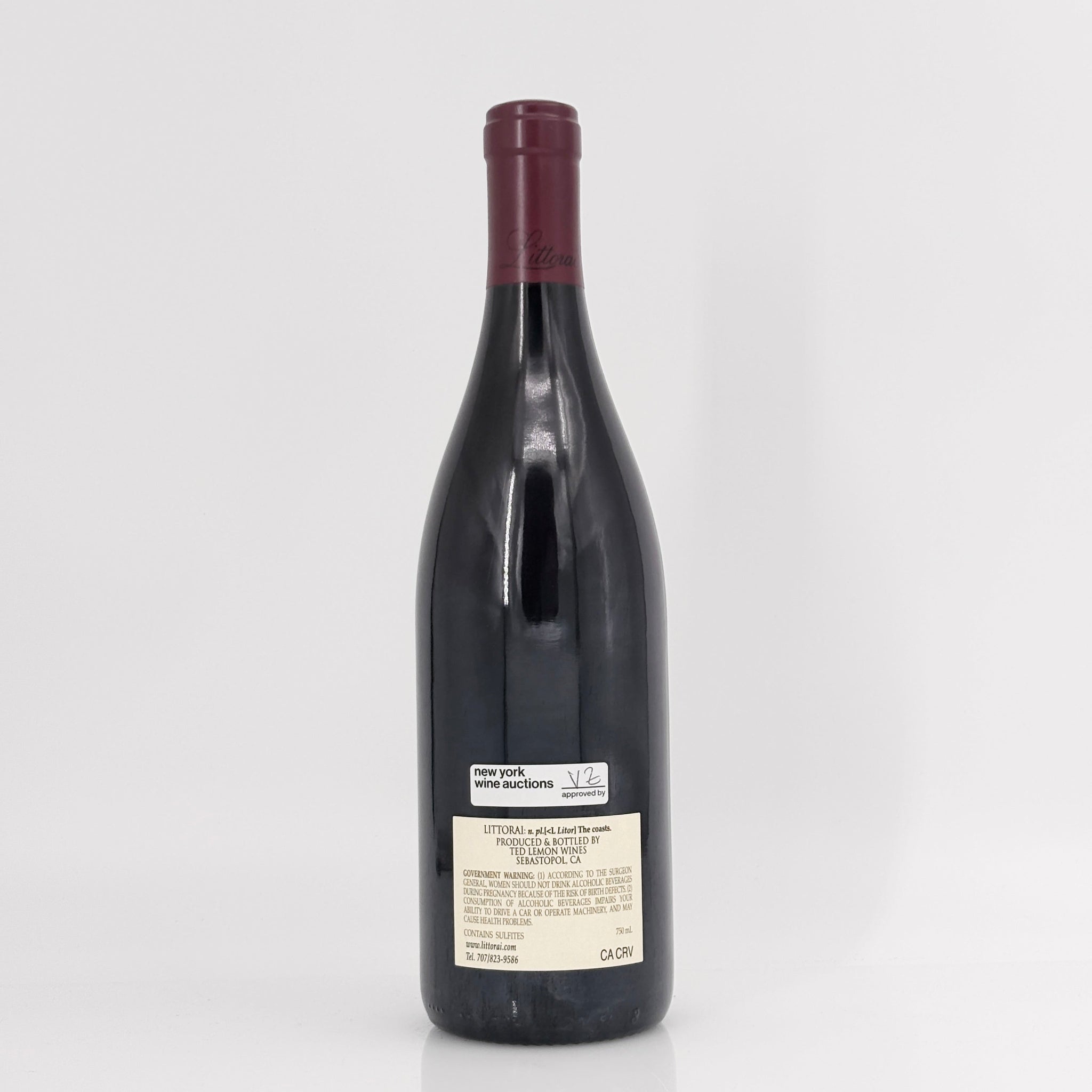 Wine bottle with a visible label on a white background