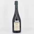 Bottle of champagne with a label on a white background