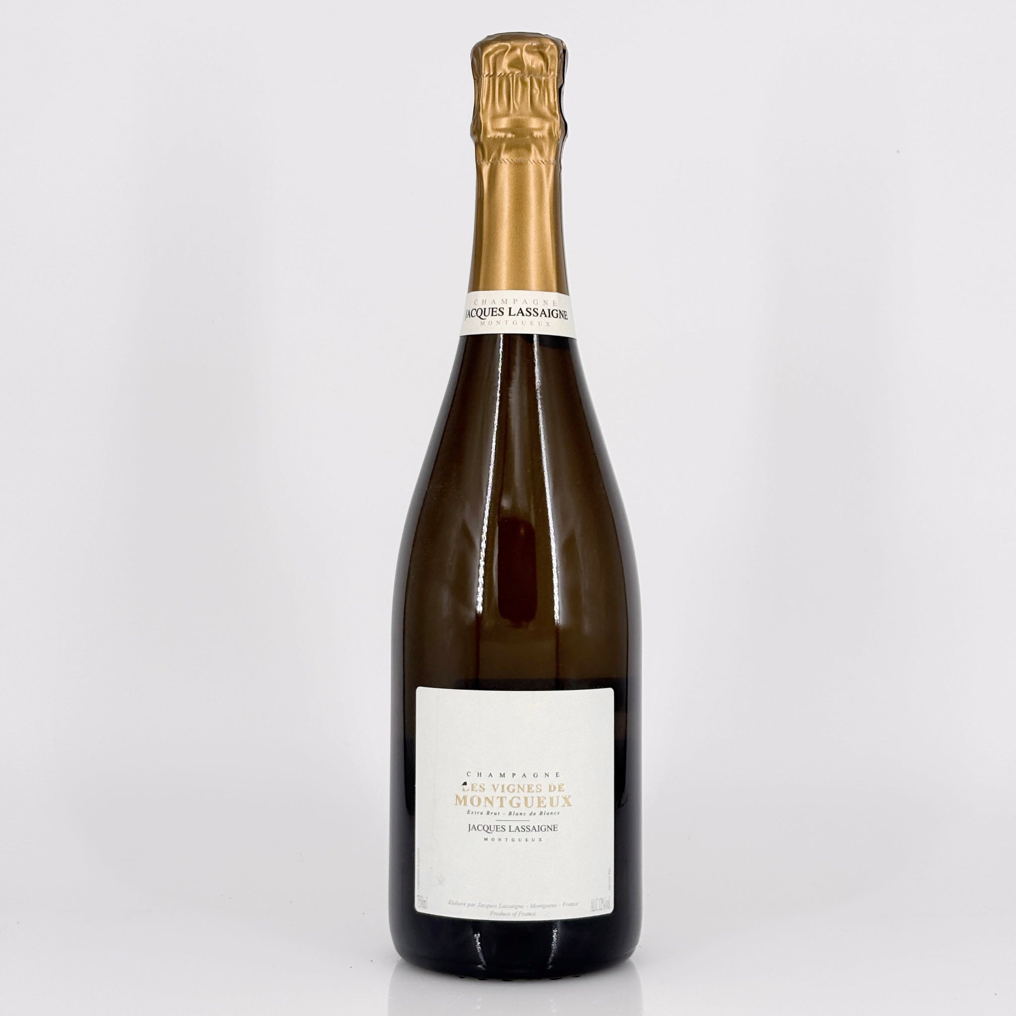 Wine bottle with a white label on a light gray background