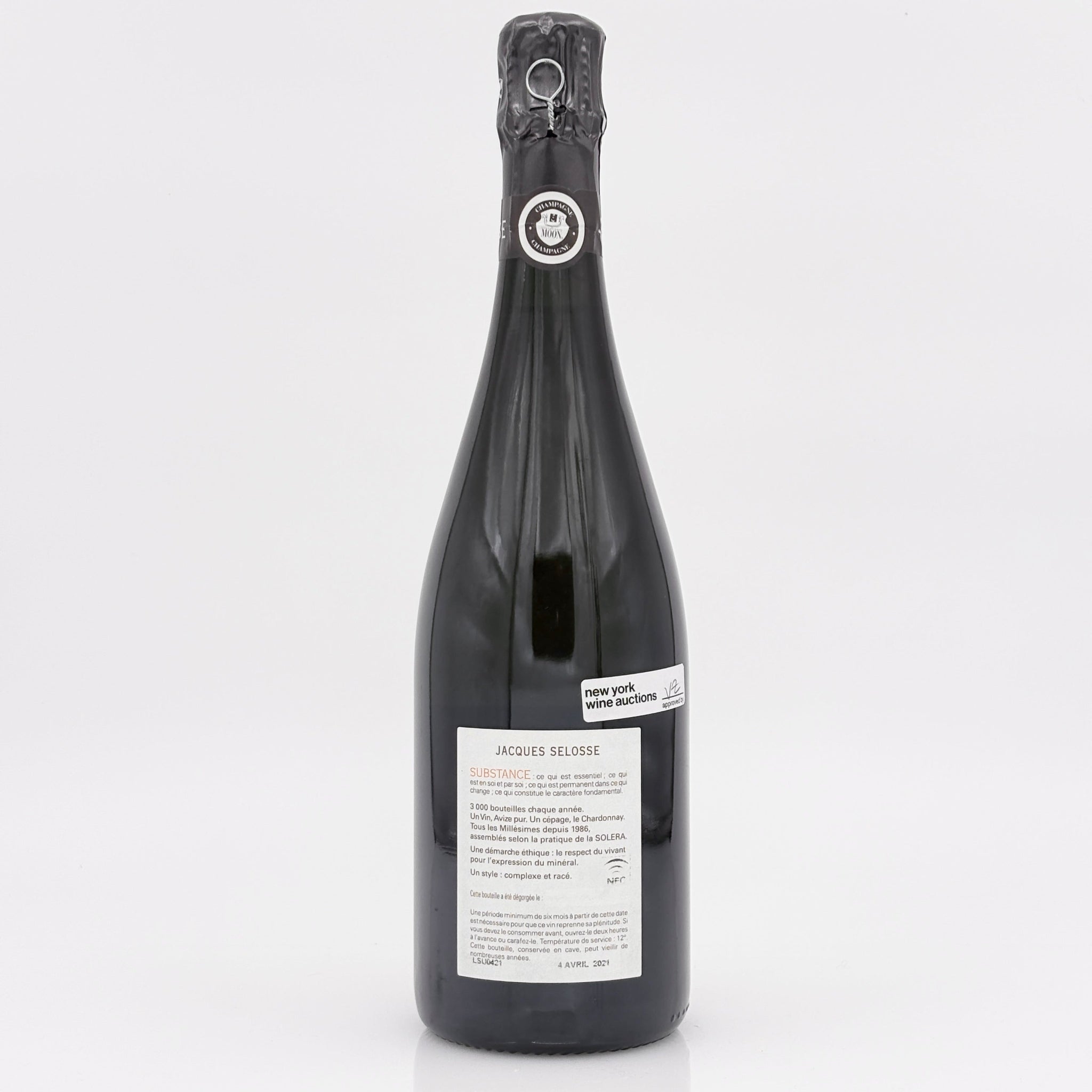 Black wine bottle with a visible label on a white background