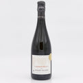Bottle of Jacques Selosse champagne on a white background