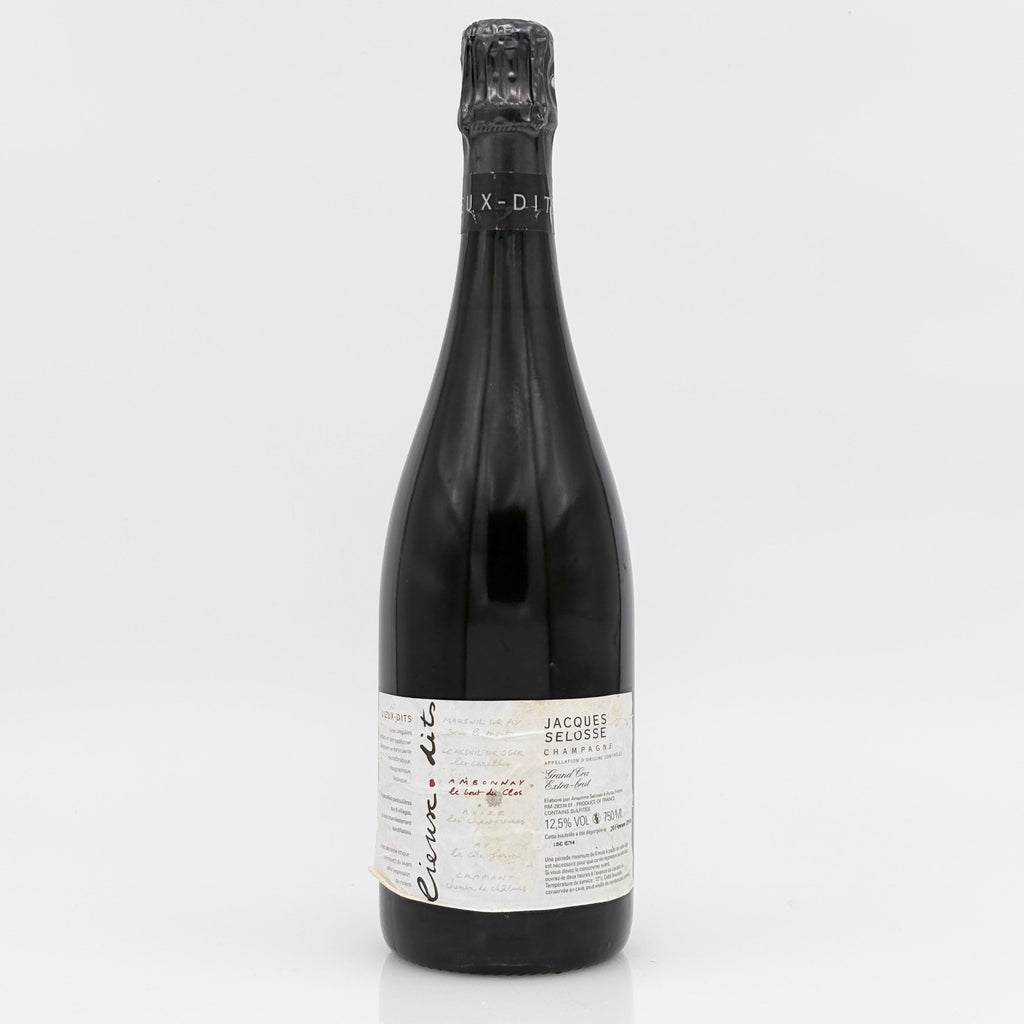 Bottle of Jacques Selosse sparkling wine on a white background