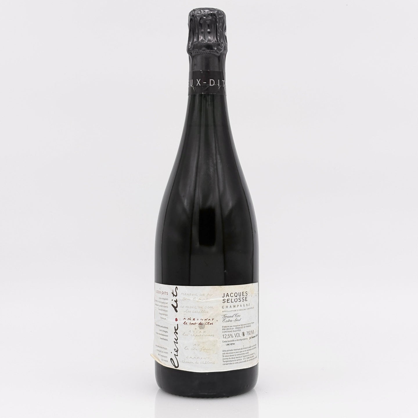 Bottle of Jacques Selosse sparkling wine on a white background