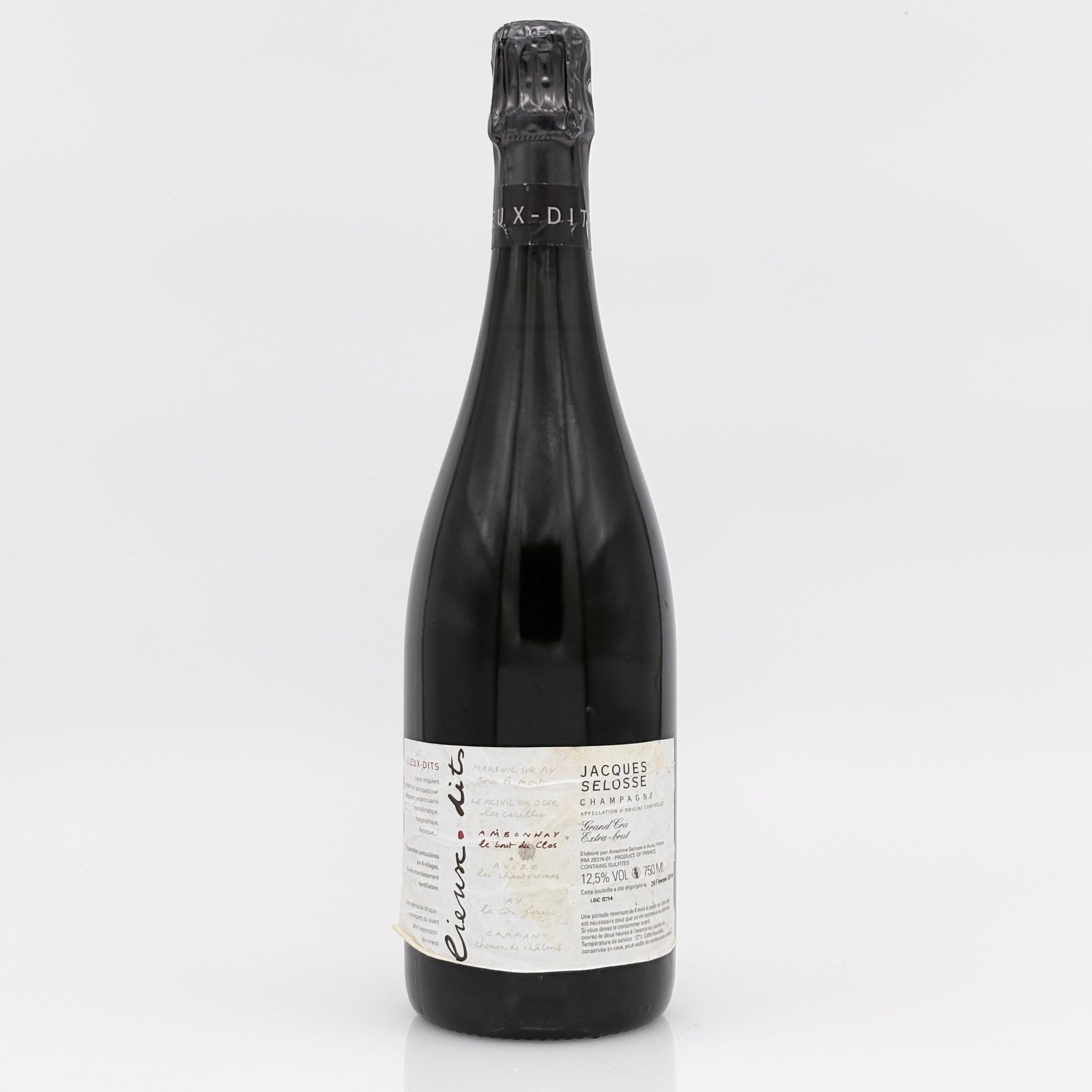 Bottle of Jacques Selosse sparkling wine on a white background