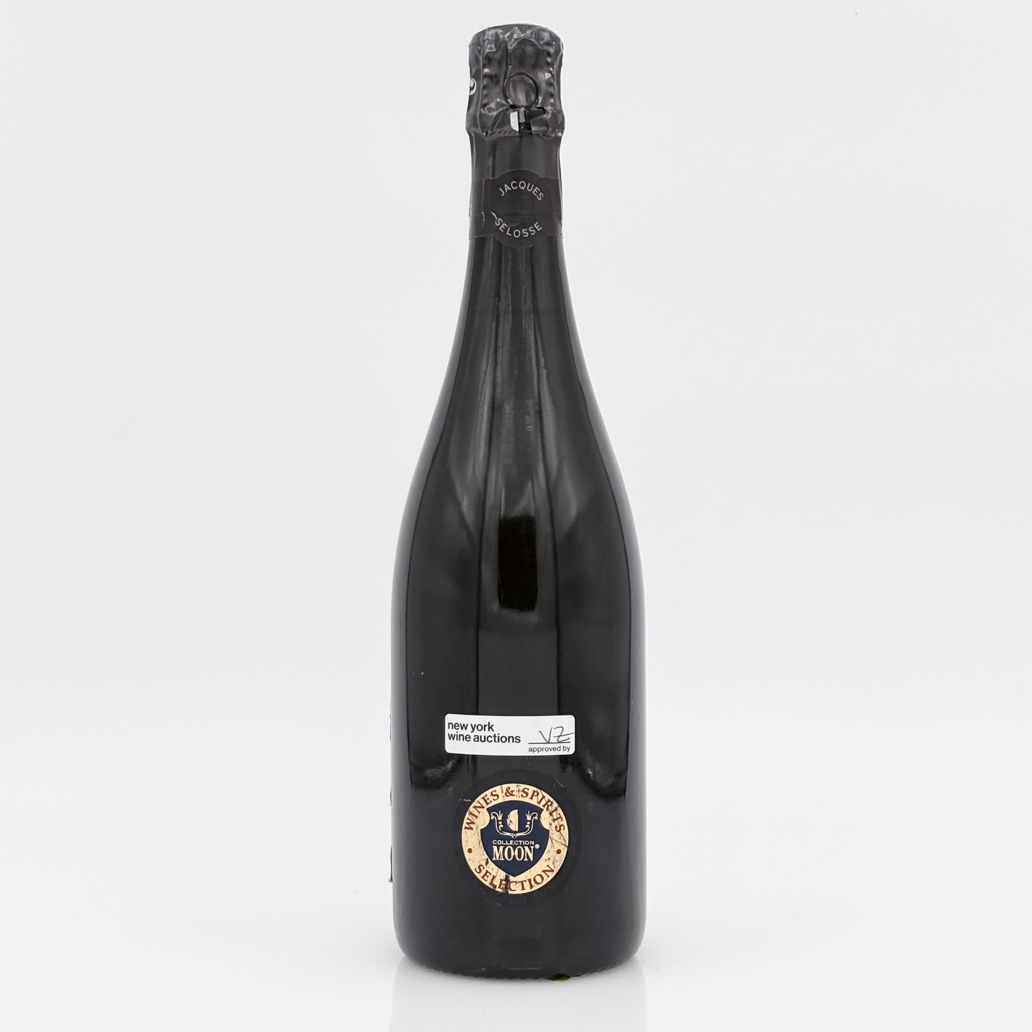 Black bottle with a label on a white background