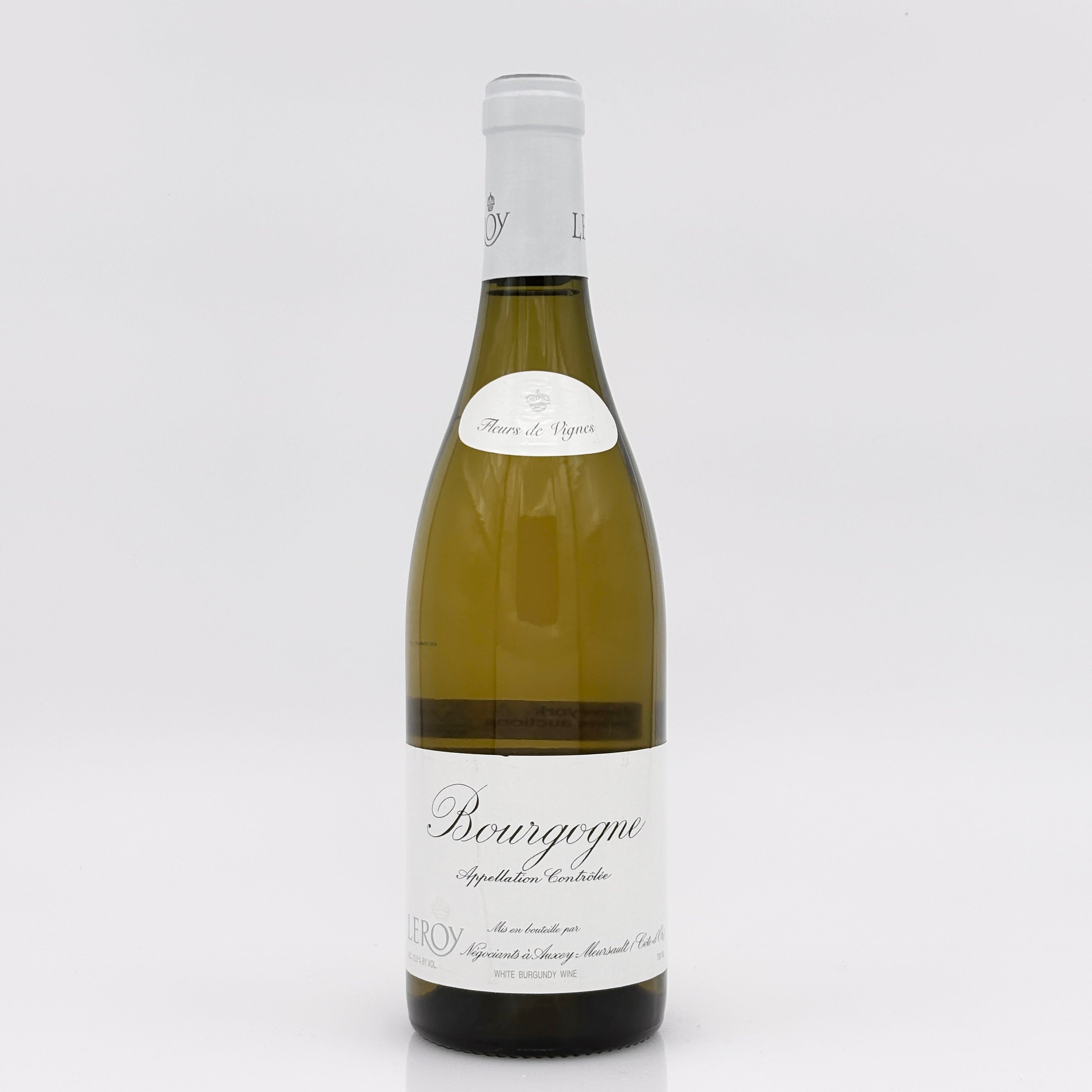 Wine bottle with a label on a white background
