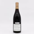 Wine bottle with a visible label on a white background